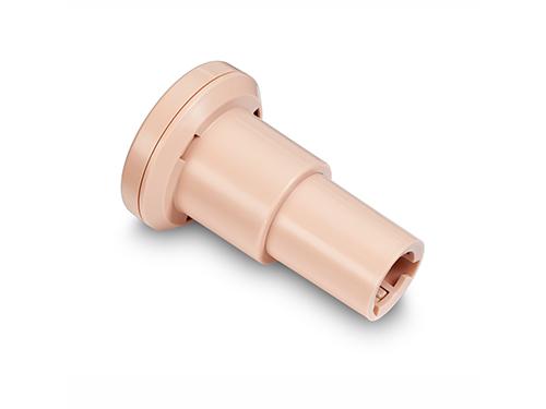 En beige kompressionspiston.