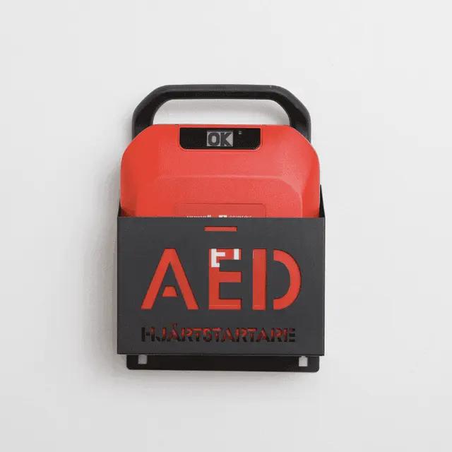 Väggfäste med hjärtstartare