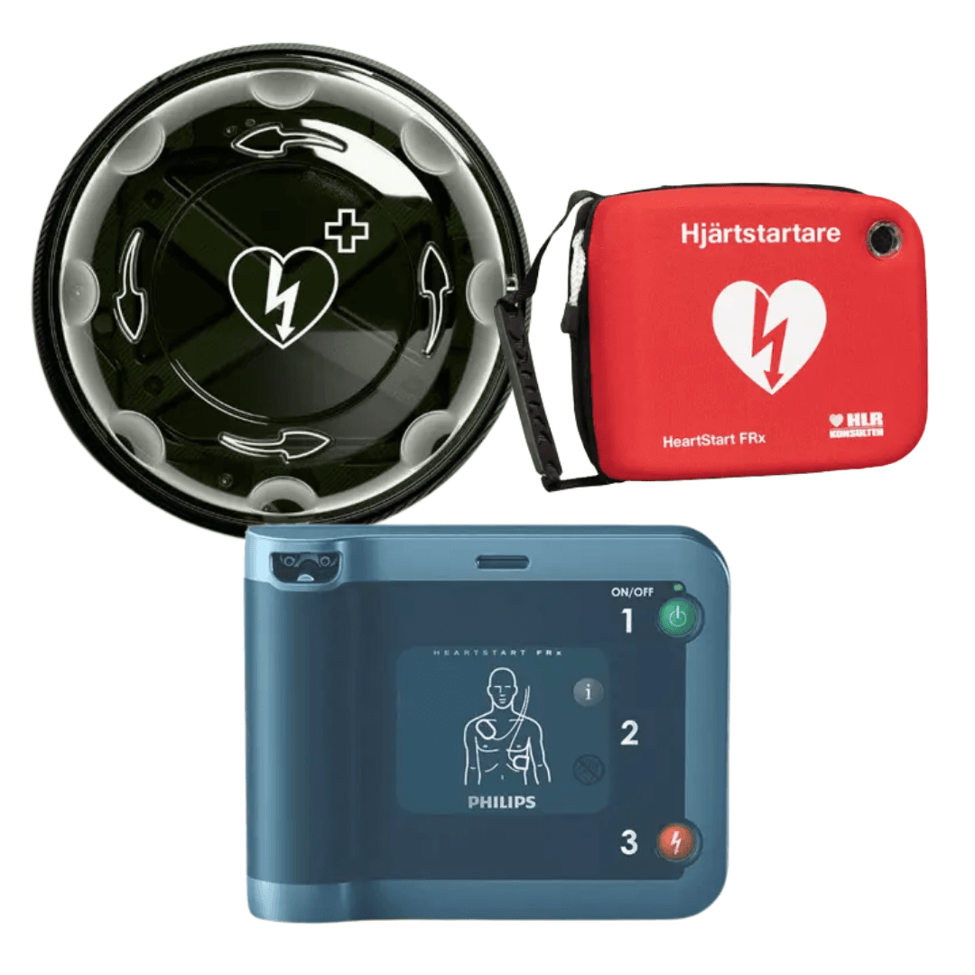 Hjärtstartare med rotaid inomhus skåp och en väska