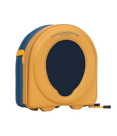 En gul och blå bärväska syns snett framifrån