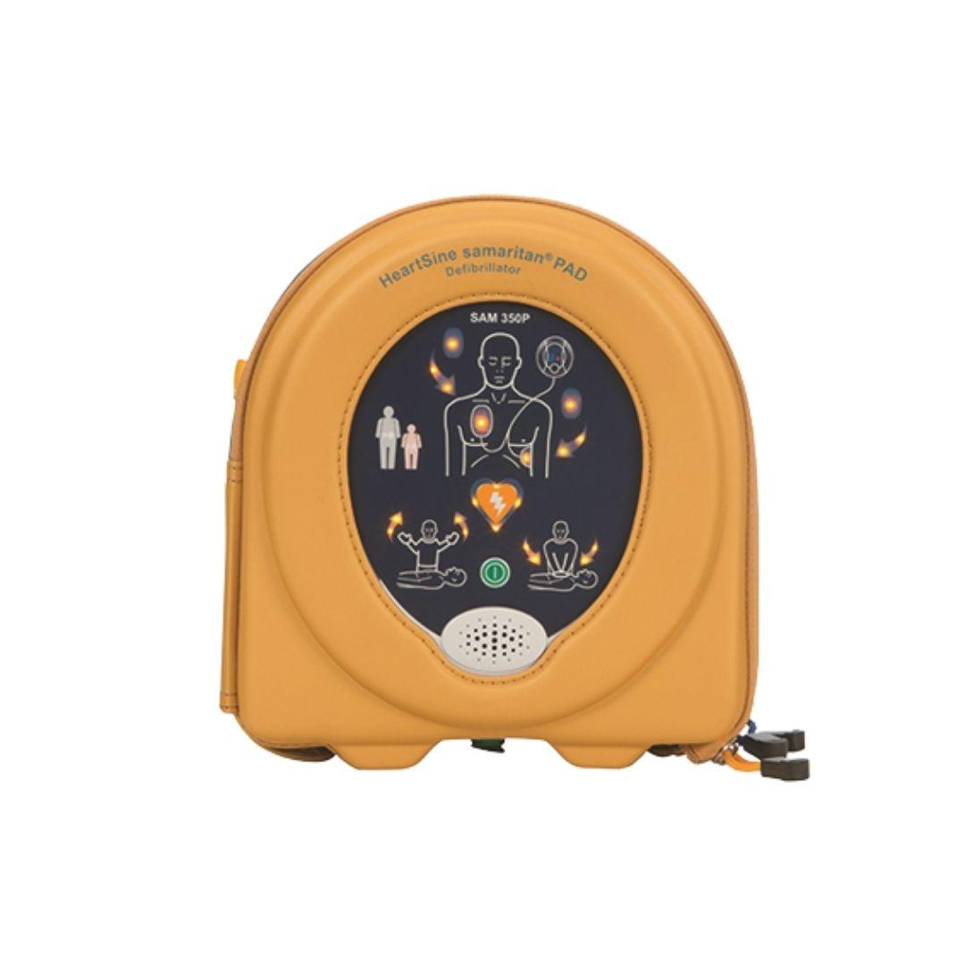 En gul bärväska syns framifrån med en hjärtstartare i