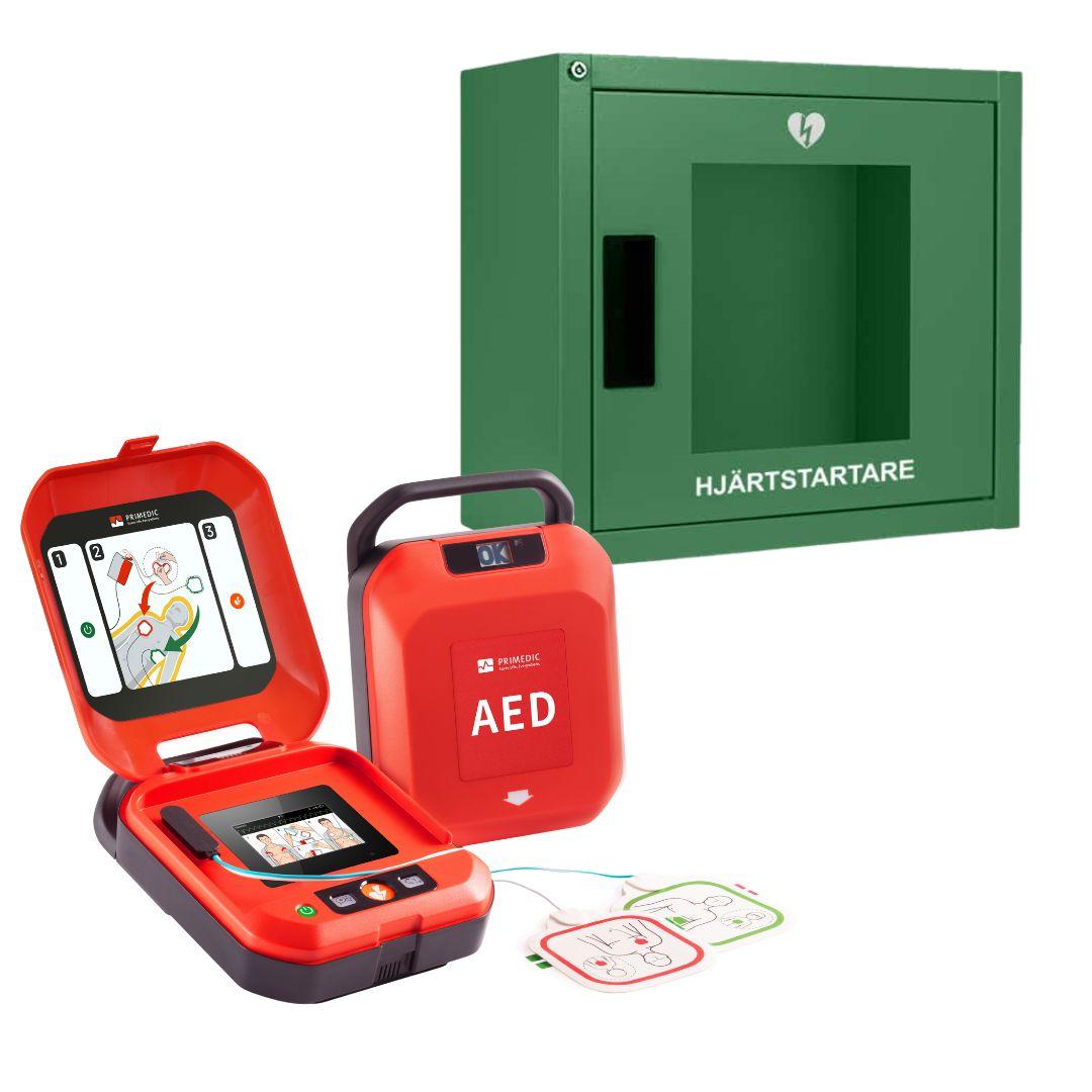 Grönt skåp till hjärtstartare tillsammans med heartsave y med skärm.