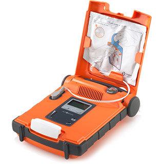 Orange Powerheart AED G5 Auto helautomatisk hjärtstartare för behandling vid plötsligt hjärtstopp.
